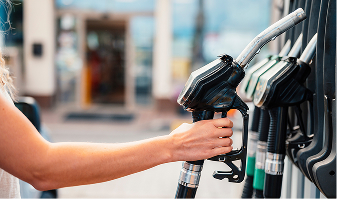 Arm lifting pump at gas station