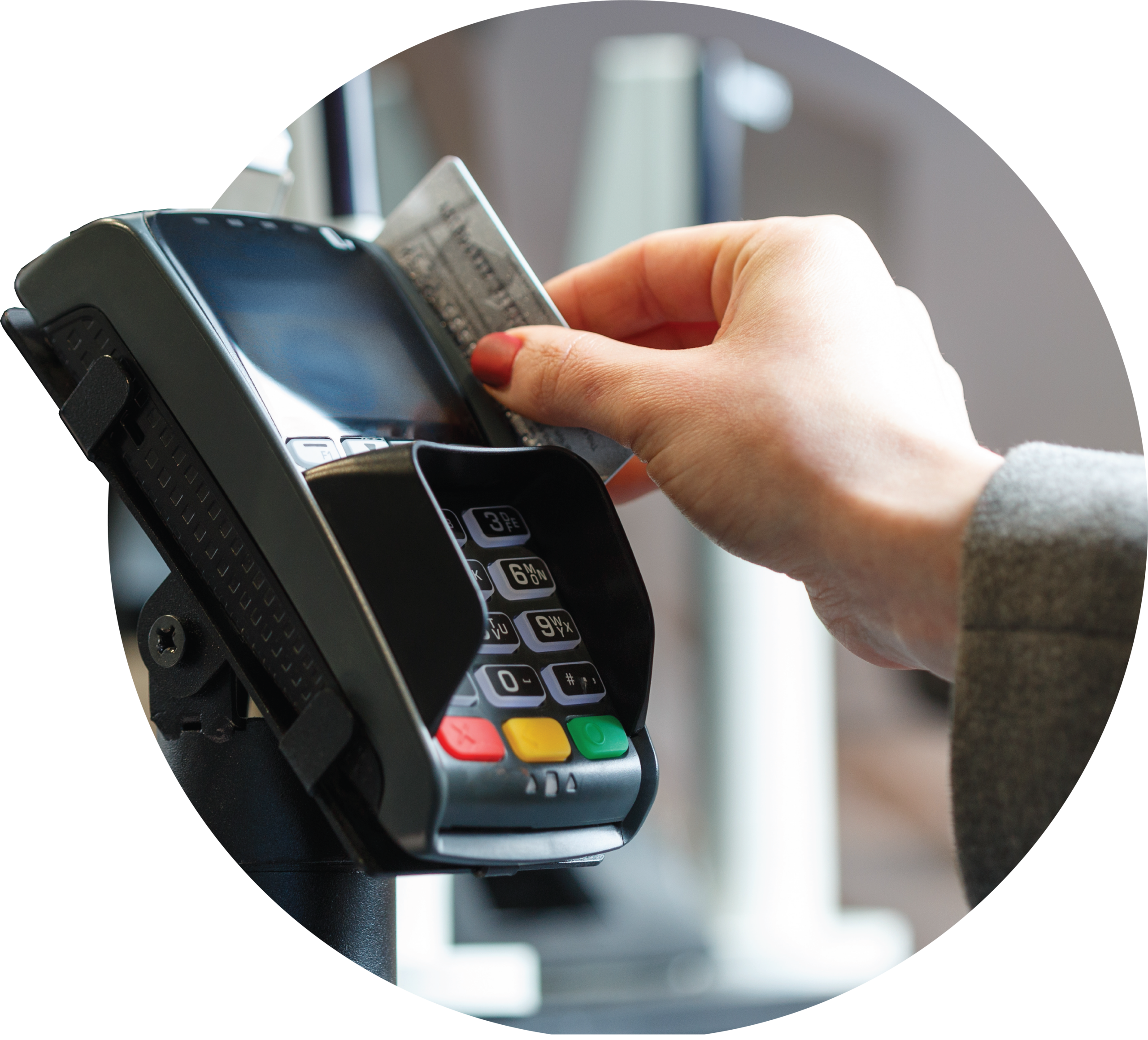 Hand swiping a card at a point of sale terminal