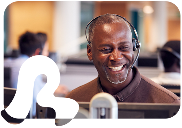 Smiling support staff in call center